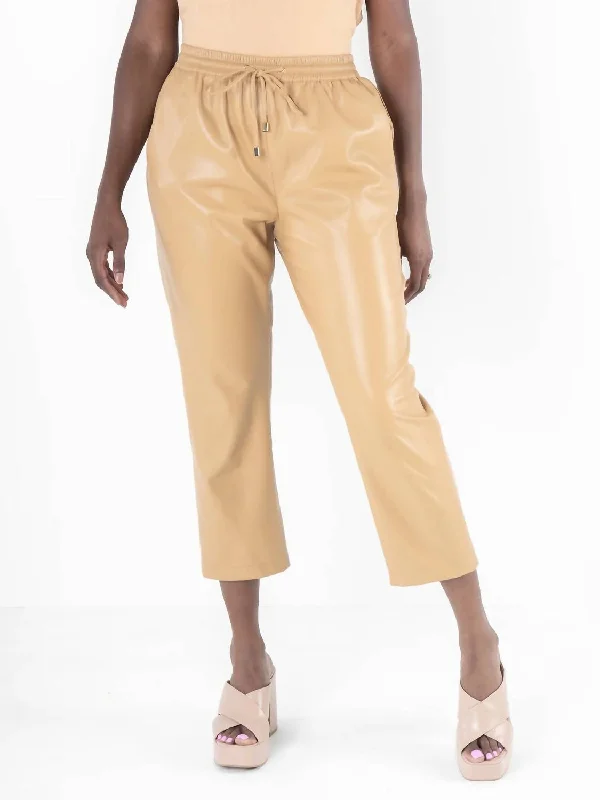 Luxury tight trousers for women with fine fabric and elegant tailoring -Joy Faux Leather Jogger Pants In Lark Beige