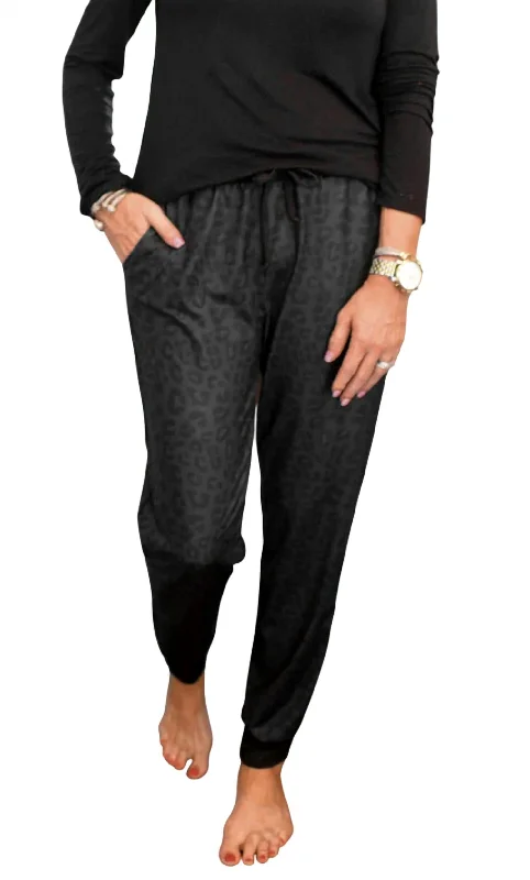 Leather tight trousers for women with edgy design and fashion-forward style -Leopard Jogger In Black