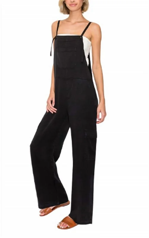 Black tight trousers for women with sleek design and versatile styling options -Around Town Wide Leg Cargo Overalls In Black